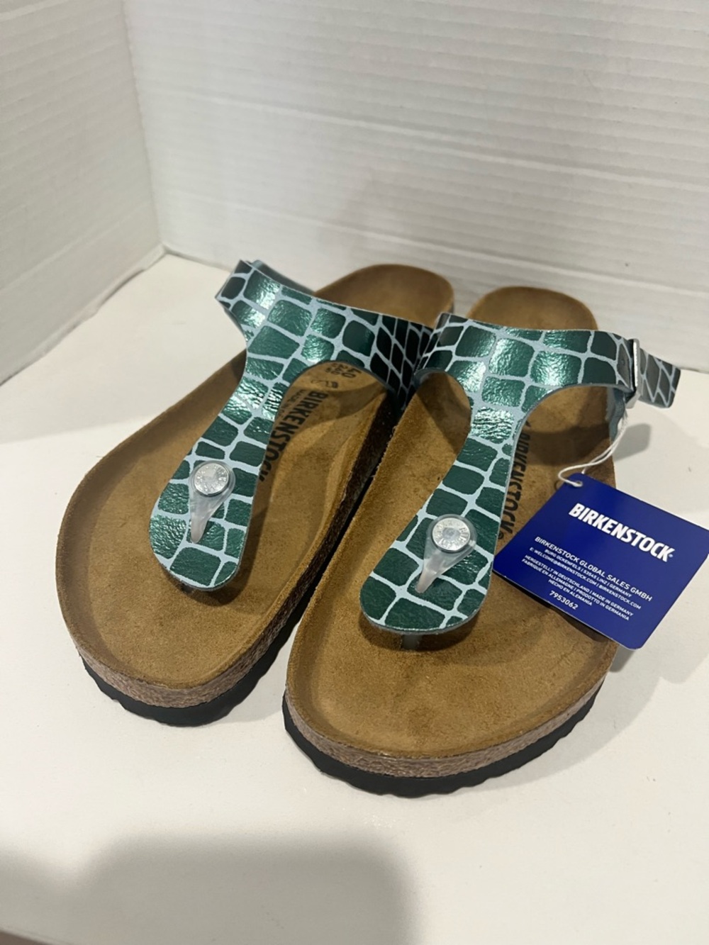 Birkenstock Gizeh model in the Gator Gleam Pearl Light Mint Silver Size W 9-9.5